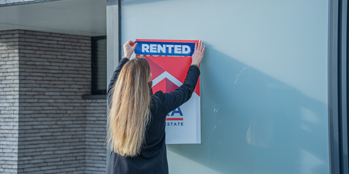 Rented sign in front of a house